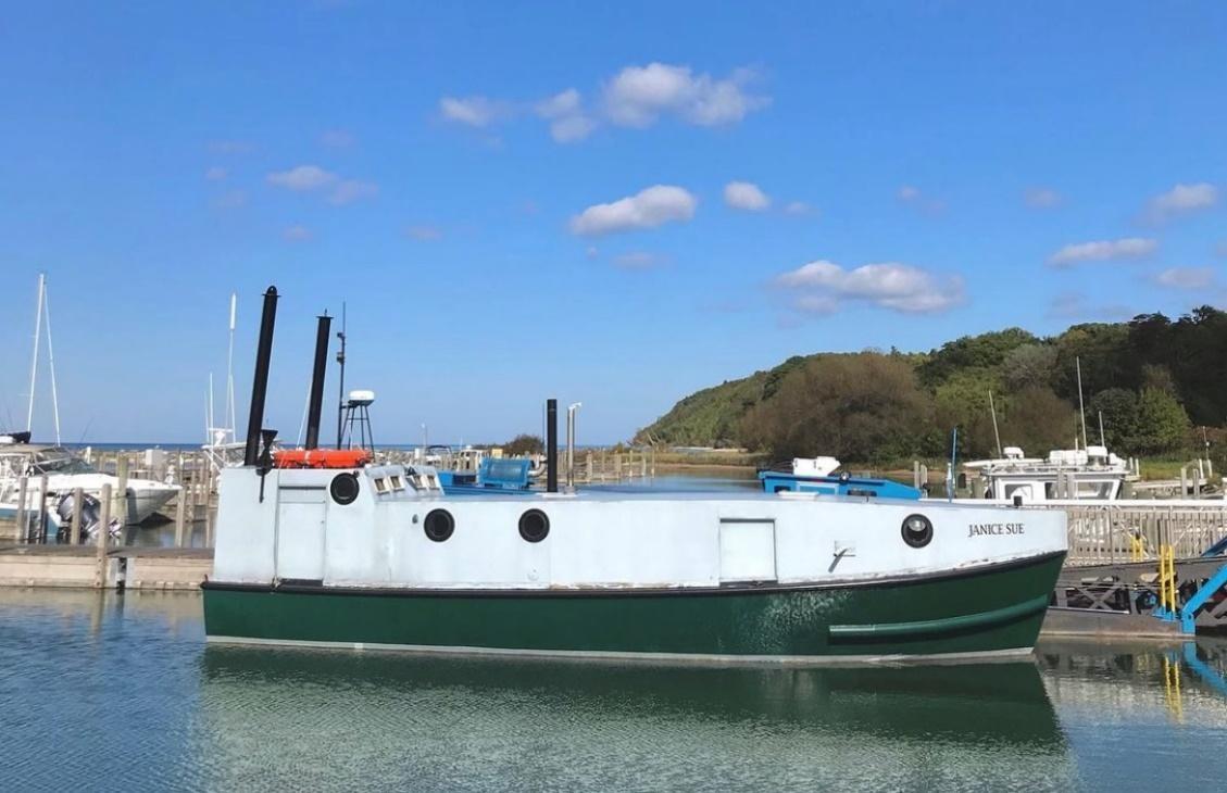 Fish tug Janice Sue in the Leland township harbor.  Fish tug Janice Sue in the Leland township harbor.